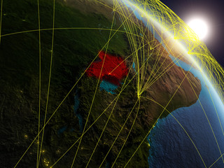 Uganda from space on realistic model of planet Earth with network. Concept of digital technology, connectivity and travel.