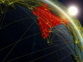 India from space on realistic model of planet Earth with network. Concept of digital technology, connectivity and travel.