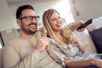 Couple at home with wine