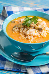 Tomato soup with rice.