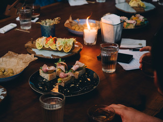 Snacks tacos on the bar table in cafe