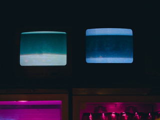 Old retro tv with noise effect in the dark