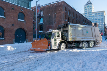 Snowplough in Brooklyn clears the streets after a blizzard in January 2016