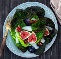 fig salad on blue plate