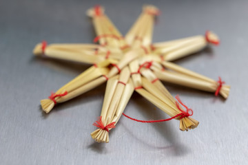 Christmas decorations on the kitchen table. Wooden Christmas figurines prepared for decorating a tree.