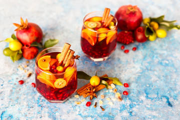Sangria pomegranate, pear, orange, kumquat and spices, cinnamon, cloves, star anise.