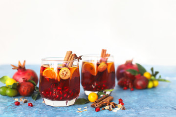 Sangria pomegranate, pear, orange, kumquat and spices, cinnamon, cloves, star anise.