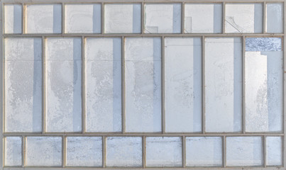 Vintage wooden window frozen by cold weather. Winter background.