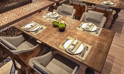 Table setup in modern Arabic restaurant, angle view, close up