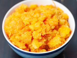 A bowl of mashed carrot and swede