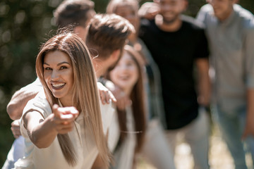 modern girl pointing at you.