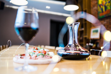glasses of red wine on table in restaurant