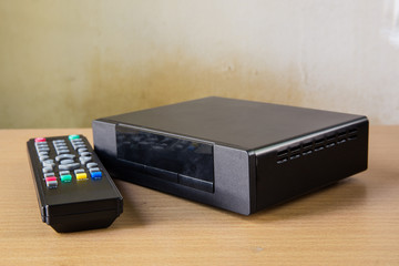 hd player with remote controler isolated on white