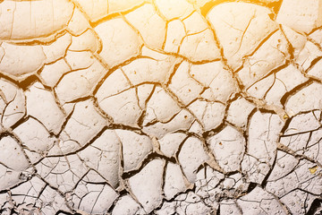 Texture, background of dry cracked earth ground. Global shortage of water on planet. Deep cracks in...