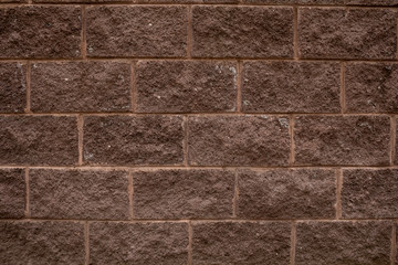 Obraz premium pared de ladrillos de piedra cafe