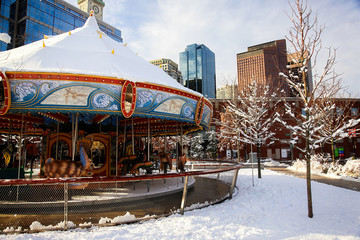 fairground carousel under the snow. Christmas bazaar © EvgeniiAnd