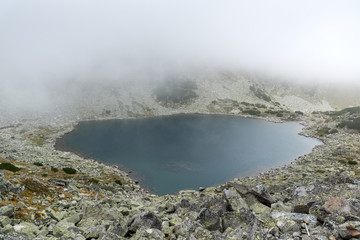Landscape with fog over Musalenski lakes,  Rila mountain, Bulgaria