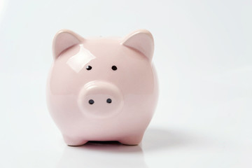 Pink piggy bank isolated on white background. Saving investment budget wealth business retirement, financial, money, banking concept. Copy space