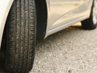 Close-up car tire and traces. used, obsolete vehicle tire.