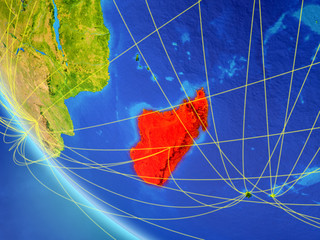 Madagascar on planet Earth from space with network. Concept of international communication, technology and travel.