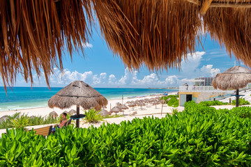 Caribbean beach and turquoise sea for a paradise landscape in Cancun, Playa delfines, Quintana Roo,...