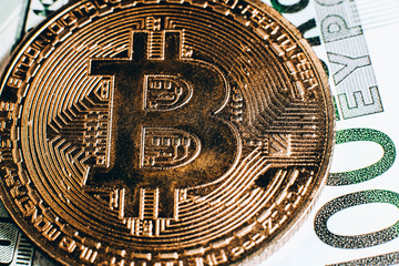  Bitcoin cryptocurrency, a coin on banknotes.