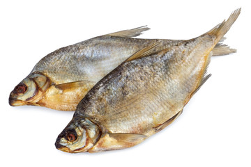 Dried salted fish isolated on white backdrop.