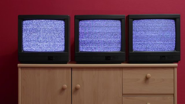 Three old TV sets