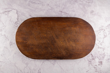 Oval shaped wood cutting board