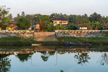 The beautiful morning view landscape of riverside village in the rural of Thailand