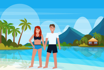 Obraz na płótnie Canvas couple on tropical island with villa bungalow hotel on beach seaside green palms mauntains landscape summer vacation concept flat horizontal