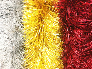 Multi colors bunch fur with bits of golden and silver for background Christmas and New year holiday