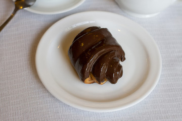 chocolate bun on white background