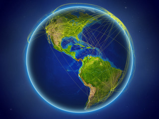 Panama from space on planet Earth with digital network representing international communication, technology and travel.
