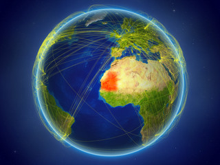 Mauritania from space on planet Earth with digital network representing international communication, technology and travel.