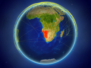 Namibia from space on planet Earth with digital network representing international communication, technology and travel.