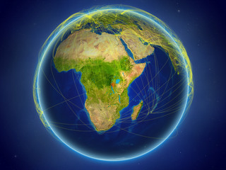 Burundi from space on planet Earth with digital network representing international communication, technology and travel.