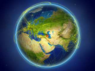 Azerbaijan from space on planet Earth with digital network representing international communication, technology and travel.