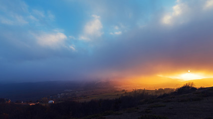 Amazing beautiful and colorful sunset in the mountains