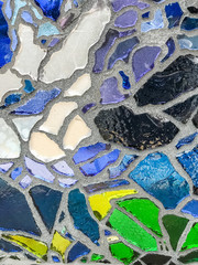 Multicolor mosaic wall decorative ornament from ceramic and glass broken tile.