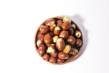 Jujube fruits close up on white.