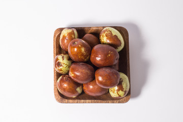 Jujube fruits close up on white.