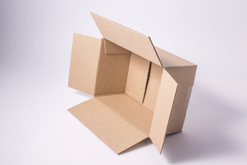 Open cardboard package box isolated.