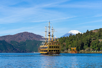 Mountain Fuji and Lake Ashi with Hakone temple and sightseeing boat in autumn