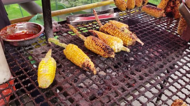 Colombian Grilled Corn, Street Food in Bogota Colombia. One of the most authentic and tasty food in the streets.