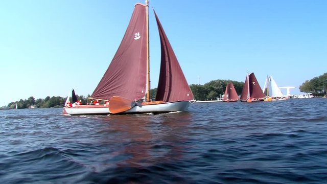 sailing with classic boats on inhore water Friesland The Netherlands