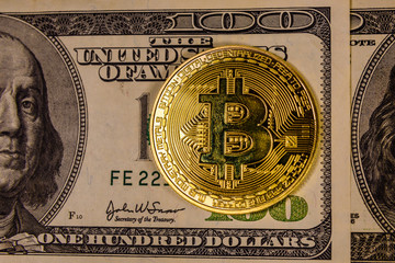 Bitcoin on the one hundred dollar bills