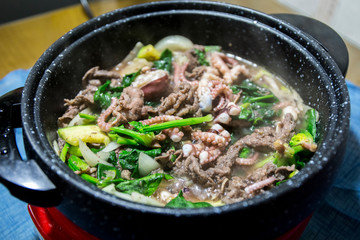 bulgogi, marinated  beef and Nakji, small octopus is cooked