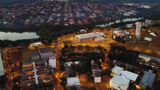 Drone shot of illuminated city with lights of Unicamp University of Campinas, Sao Paulo, Brazil