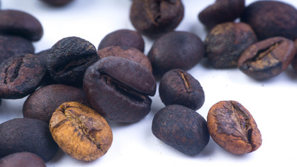 Coffee beans closeup with selective focus and crop fragment